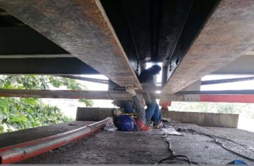 Grinding of existing paint on Girder above pier column 1 & Abutment B-carmen steel-rmbrci