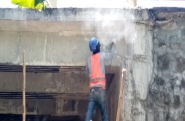 grinding of excess epoxy mortar prior to application of CFS-girder-camerino bridge-rmbrci